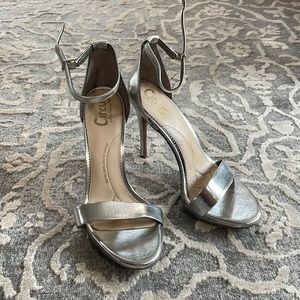 Silver strap high heels.